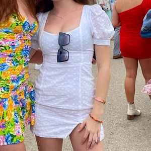 Showpo Eyelet Mini Dress— backless with ties; puff sleeves; white